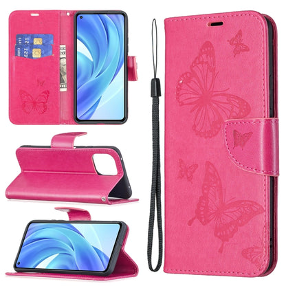 Hot pink PU leather phone wallet case with butterfly embossing, card slot, and lanyard