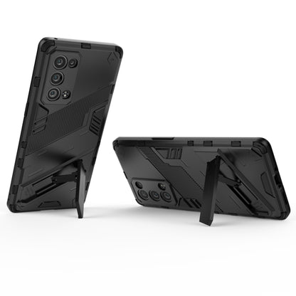 Black rugged phone case with kickstand, reinforced corners, and camera cutouts