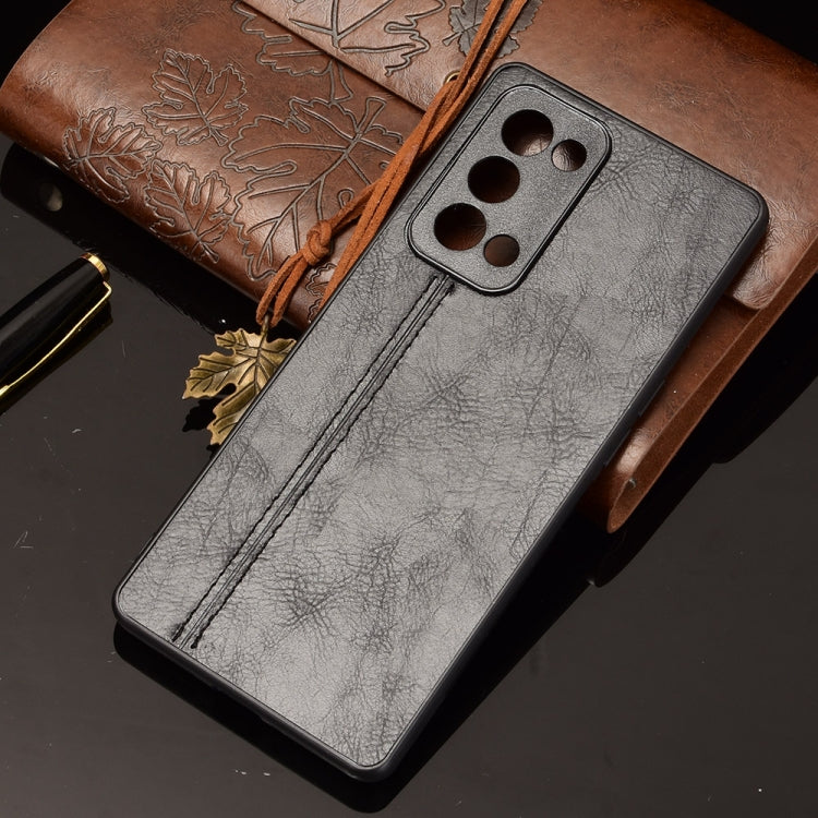 Gray faux-leather phone case with camera cutout and long vertical stitching line