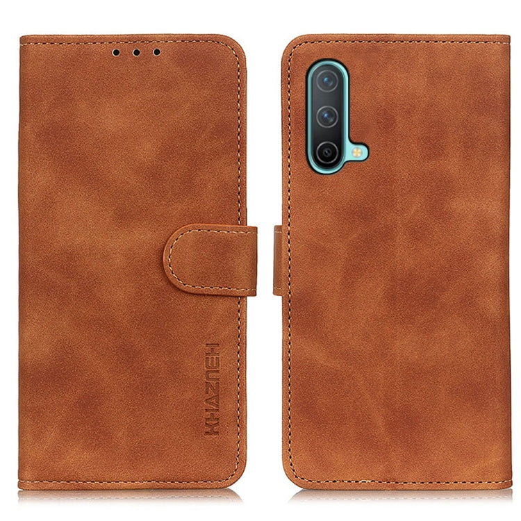 Brown leather-style flip phone case with cutouts, stitching, and flip card holder