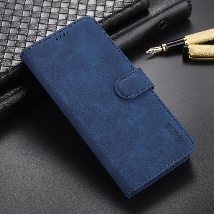 Blue leather flip phone case with card slots and holder, close-up of flap