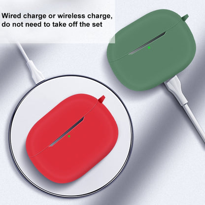 Green silicone earbud case cover with enclosed earbuds and cable-ready fit