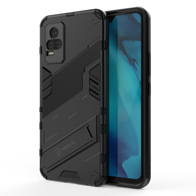 Black rugged phone case with shockproof TPU bumper and fold-out stand