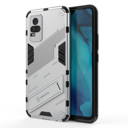 White shockproof phone case with rugged armor design, raised edges, built-in holder