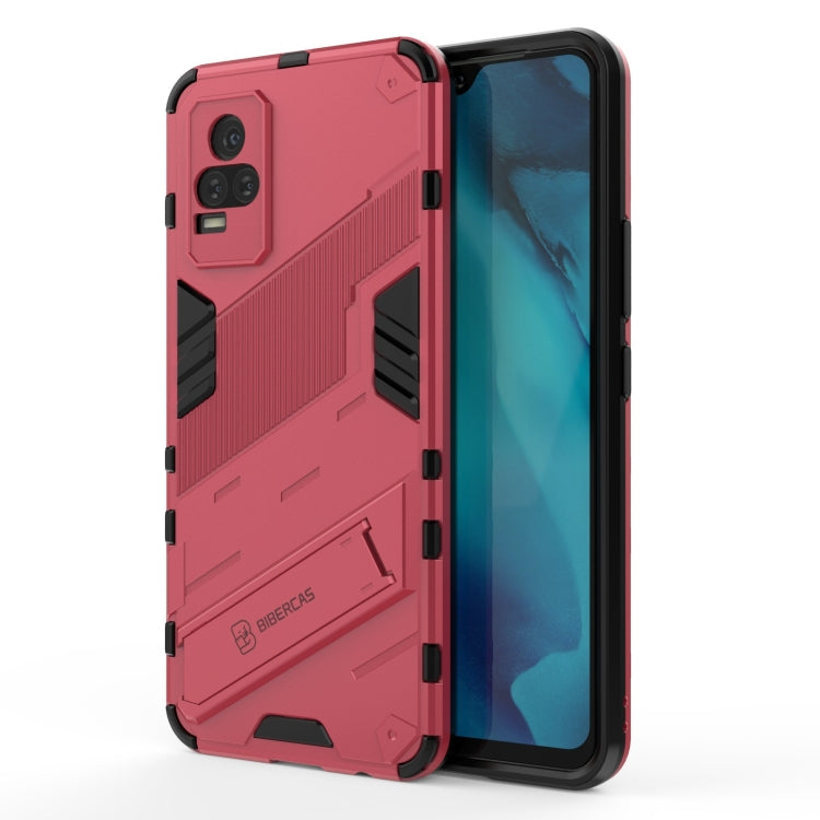 Rugged red phone case with black shockproof armor and camera cutouts