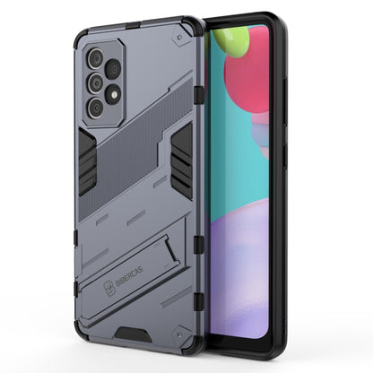 Dark gray shockproof phone case with rugged armor design, raised edges, built-in holder