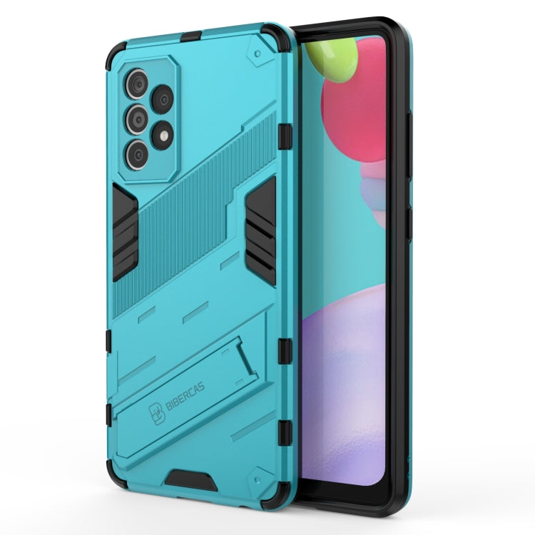 Light teal shockproof phone case with rugged armor design, raised edges, built-in holder