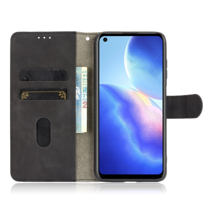 Black PU leather flip phone case with card slots and magnetic buckle, phone inside