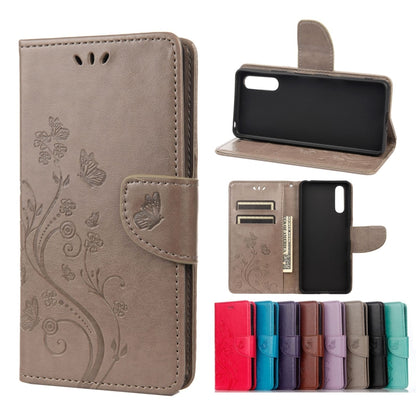 Brown butterfly-pattern leather flip phone case wallet with card slots and stand