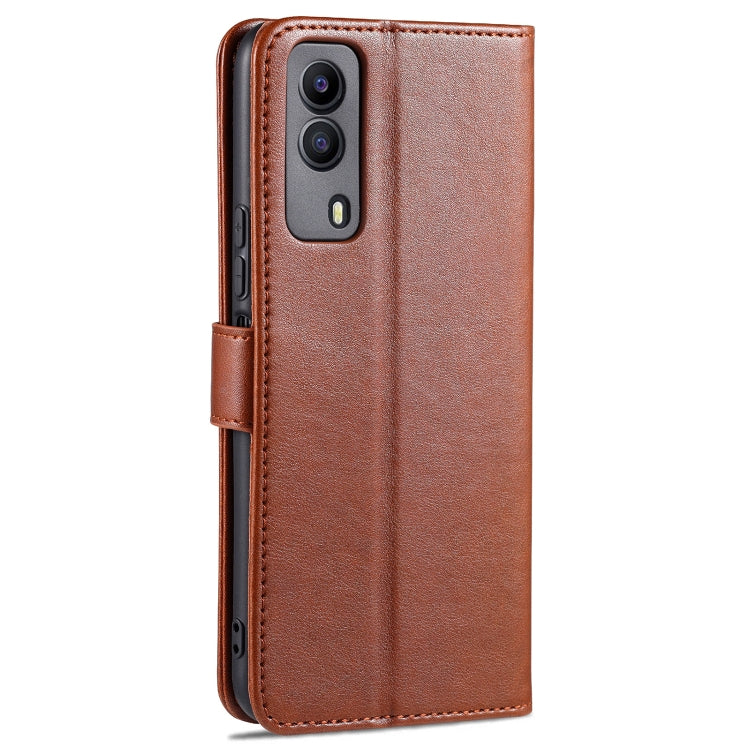 Brown flip leather wallet case with strap, side buttons, and camera opening visible.