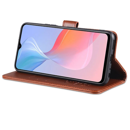 Brown flip leather wallet case with kickstand fold, phone held in landscape position.