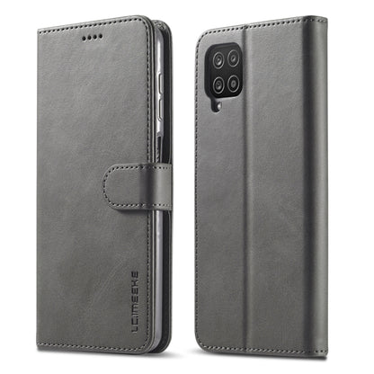 Gray leather flip phone wallet case with side strap and multi-camera cutout
