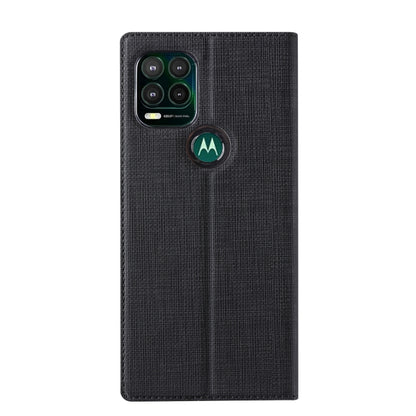 Magnetic flip phone case in dark fabric with camera cutout and round holder