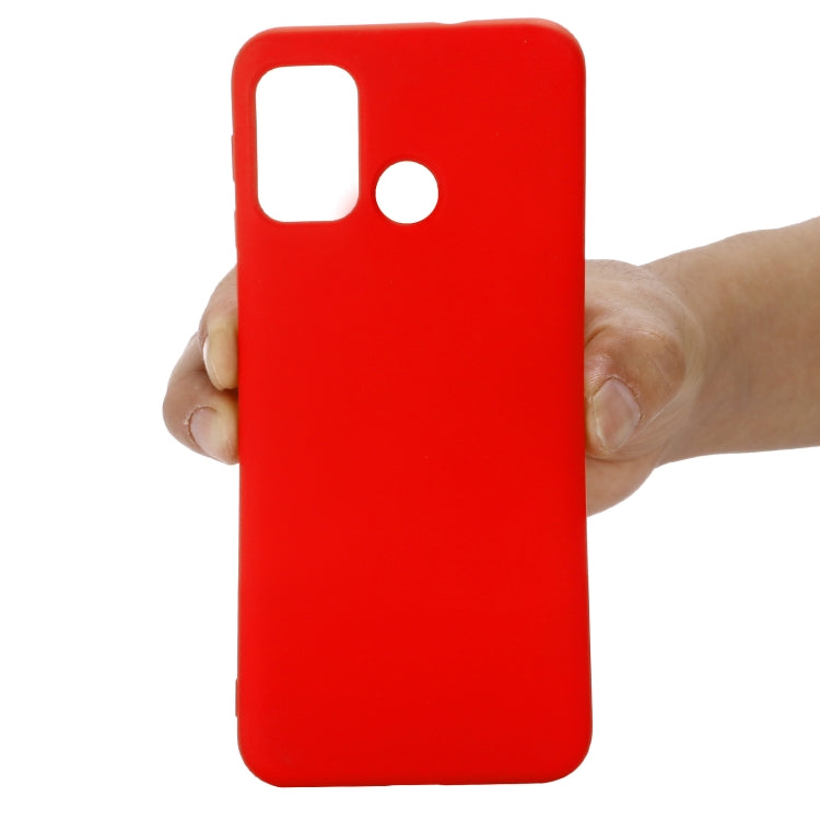Red liquid silicone protective phone case back with port openings for Motorola Moto G60