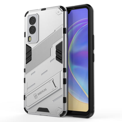 White rugged phone case with armor-style texture, shockproof edges, and camera cutouts