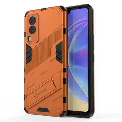 Orange rugged phone case with armor texture, shockproof corners, and camera cutouts