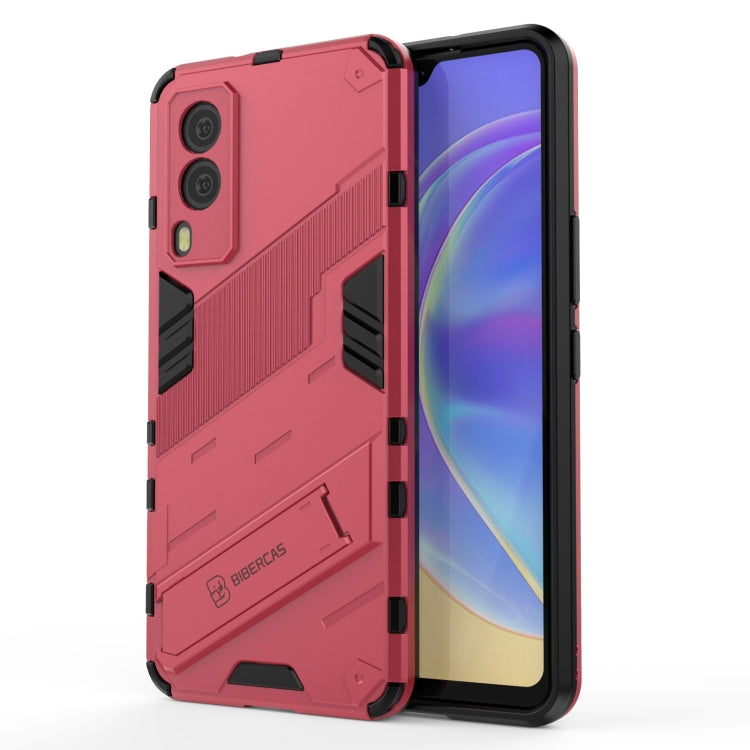 Red rugged phone case with armor texture, shockproof corners, and camera cutouts