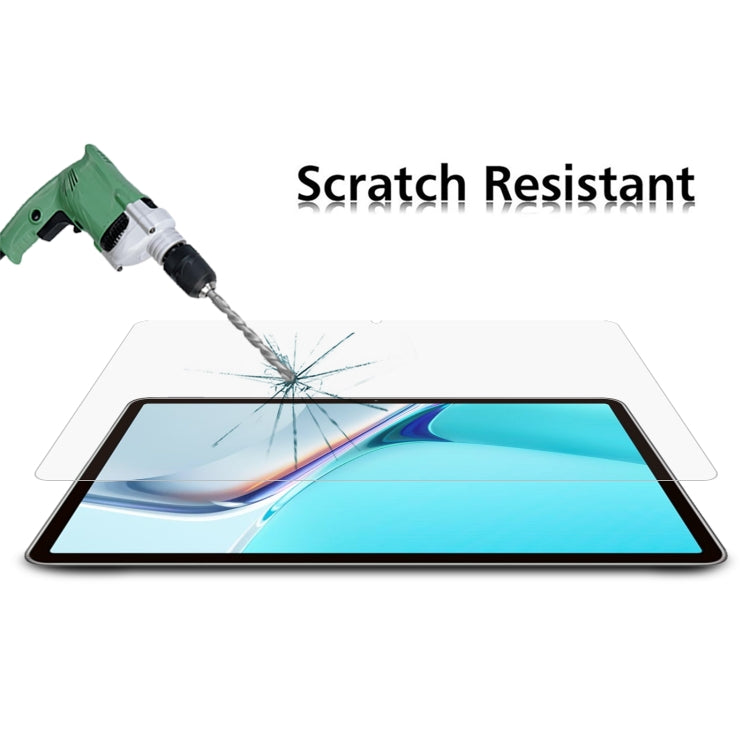 Clear tempered glass screen protector film laid over a tablet display