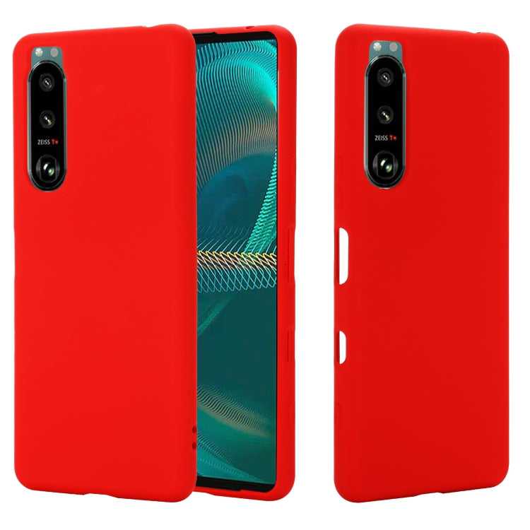 Red liquid silicone phone case with full coverage, side button cutouts