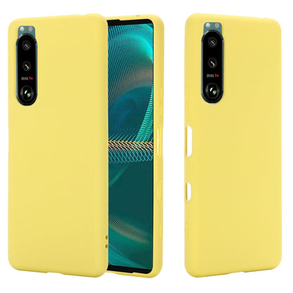 Yellow liquid silicone phone case with full coverage and camera cutouts