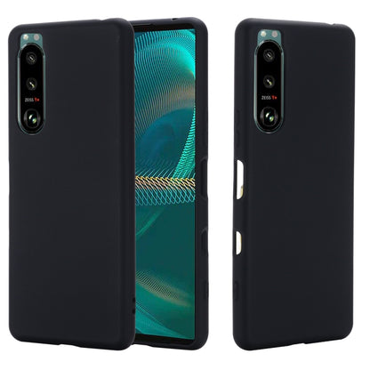 Black liquid silicone phone case with full coverage and camera openings