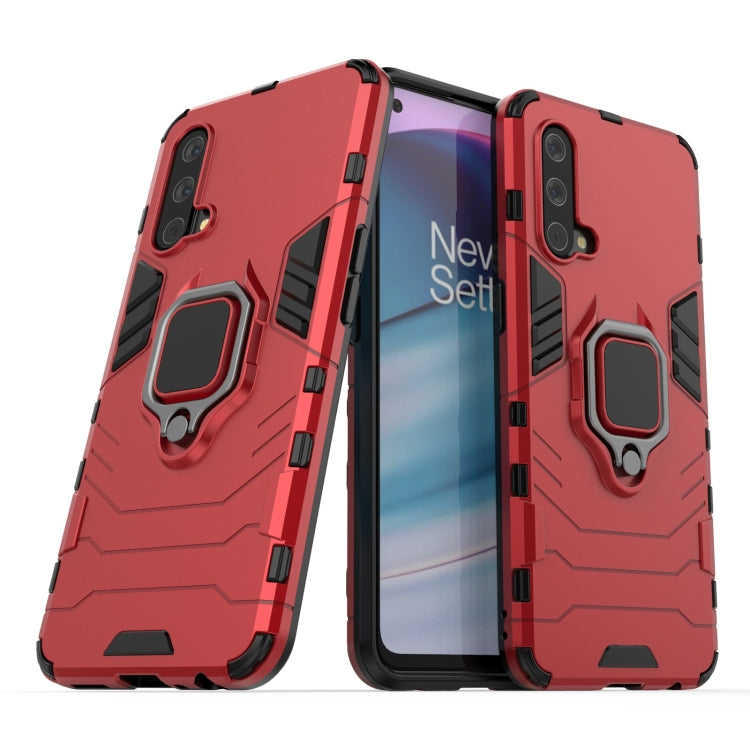 Red shockproof phone case with magnetic ring holder and cutouts for cameras and ports.