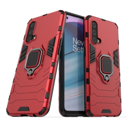 Red shockproof phone case with magnetic ring holder and cutouts for cameras and ports.