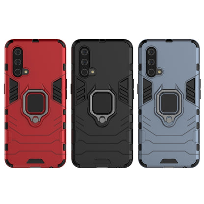 Rugged phone cases in red, black, and navy blue with magnetic ring holder and camera cutouts.