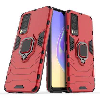 Red rugged shockproof phone case with magnetic ring holder and protective bumper corners.