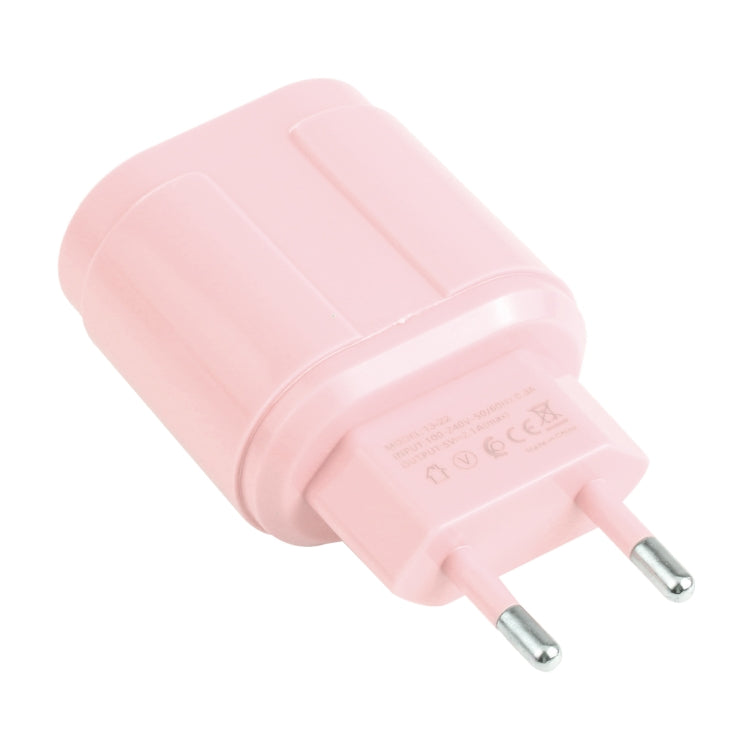 Pink EU plug dual-USB travel charger, rear side with certification markings