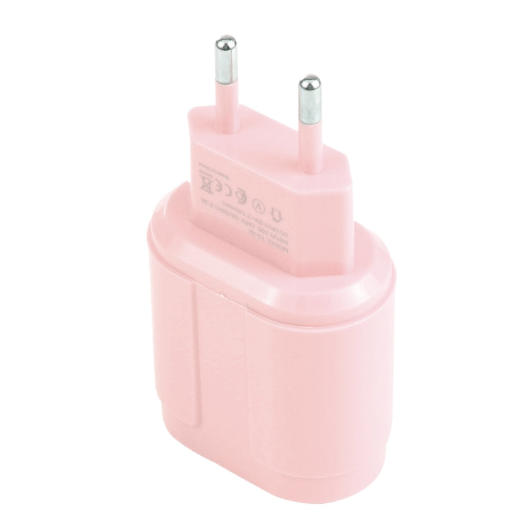 Pink dual-USB travel charger with EU plug, two round pins, rear view