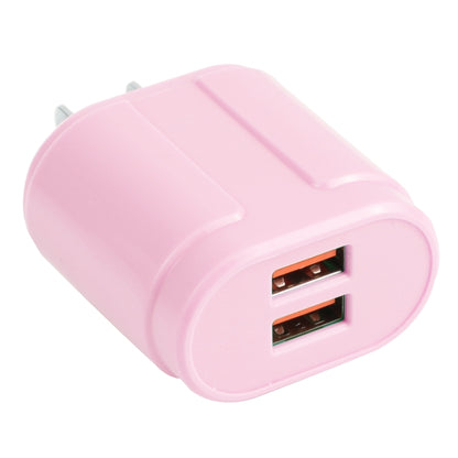 Pink dual USB travel charger with 2 ports and plug prongs