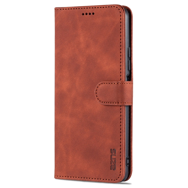 Brown leather flip phone case with card slot window and side cutouts, front view