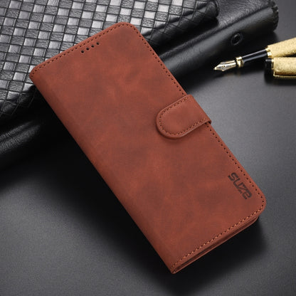 Brown leather flip phone case with card slot flap and stitched edges