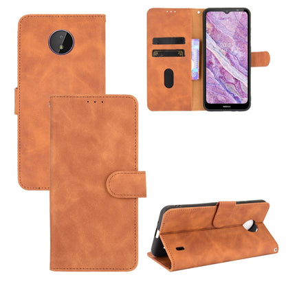 Brown PU leather flip phone case with magnetic buckle, card slots, and stand