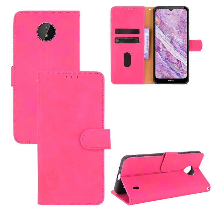 Rose red PU leather flip phone case with magnetic buckle, card slots, and stand
