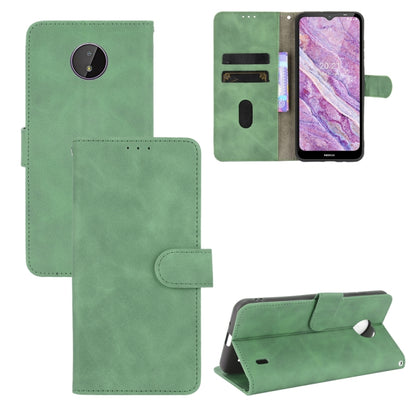Green PU leather flip phone case with magnetic buckle, card slots, and stand