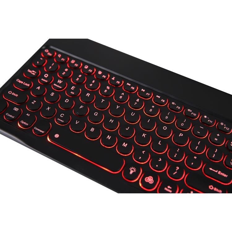 Black Bluetooth keyboard with detachable round keycaps and red backlight, angled view