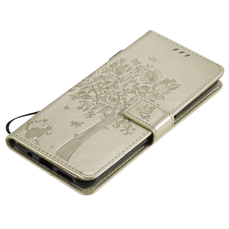 Gold tree and cat pattern PU leather flip phone case with magnetic closure flap