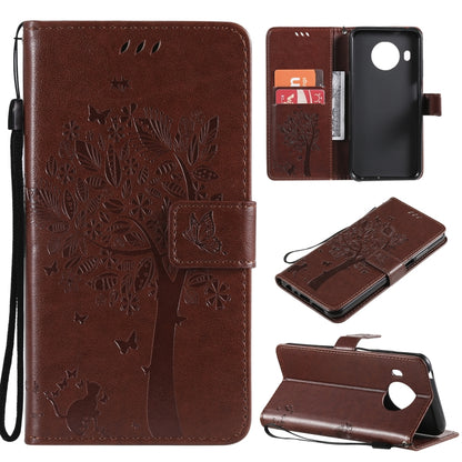 Brown PU leather phone wallet case with tree and cat embossed pattern, card slots, lanyard.