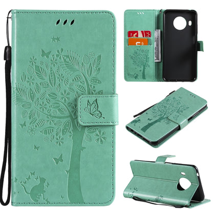 Green PU leather phone wallet case with tree and butterfly embossed pattern, card slots, lanyard.