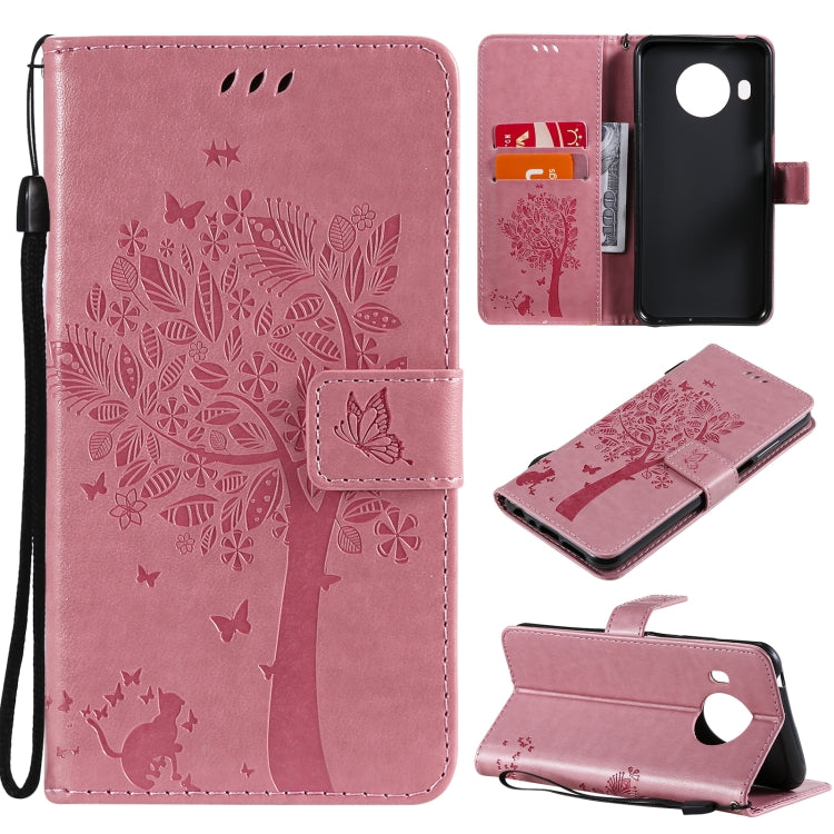 Light pink PU leather phone wallet case with tree and butterfly embossed pattern, card slots, lanyard.