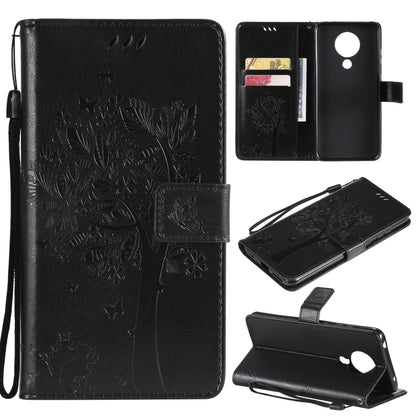 Black leather phone wallet case with tree and butterfly pattern, flip cover, card slots