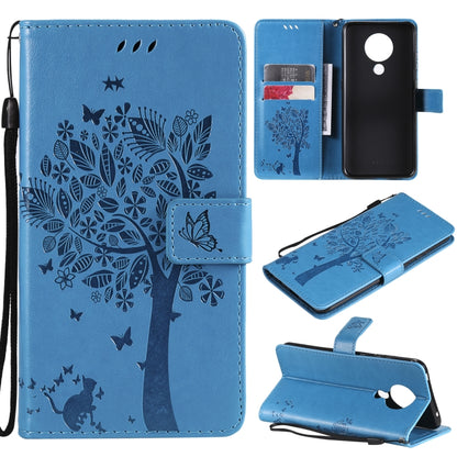 Blue leather phone wallet case with tree and butterfly pattern, flip cover, card slots
