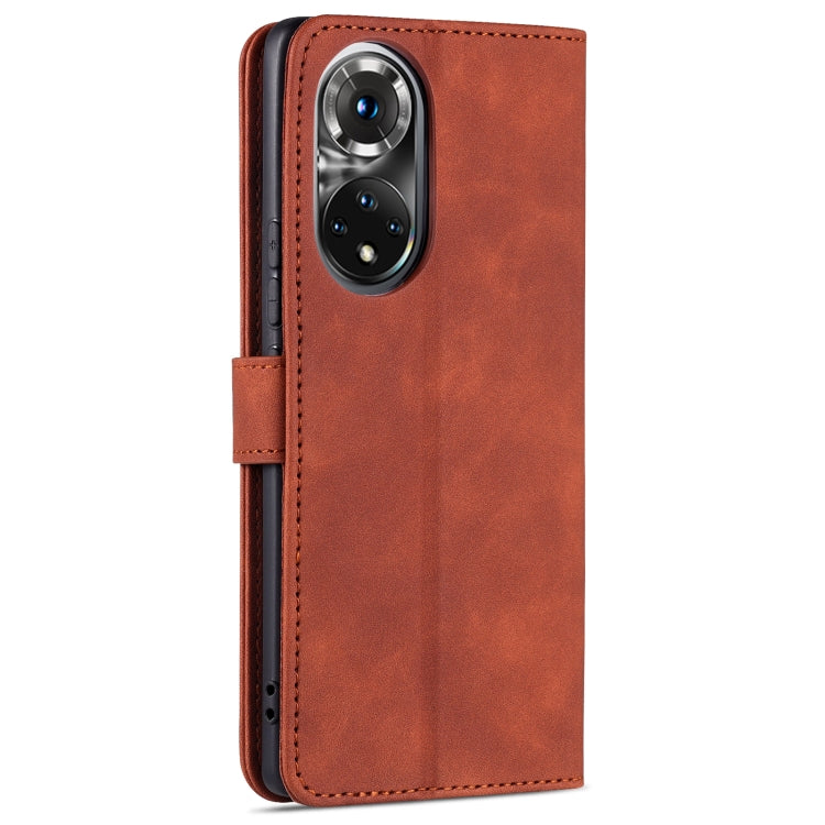 Brown leather flip phone wallet case with camera cutout and side buttons