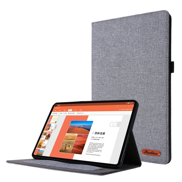 Gray fabric-texture flip case with stand; tablet held upright