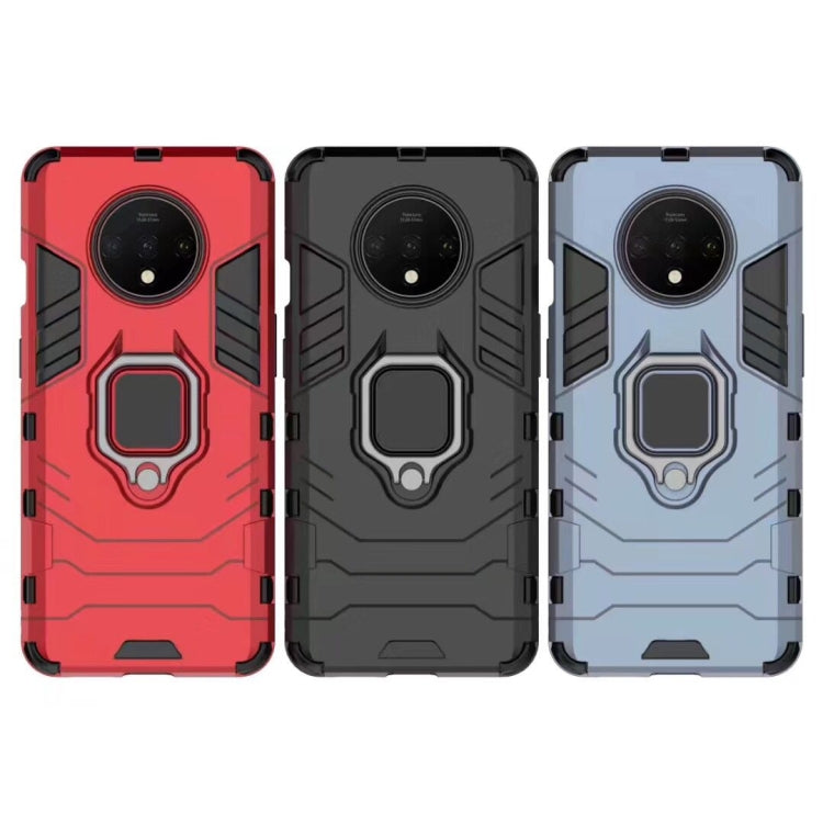 Shockproof phone case set in red, black, and light blue with magnetic ring holder