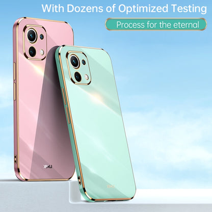 TPU phone case pair in pink and light teal with gold-tone edges for Xiaomi Mi 11 Lite