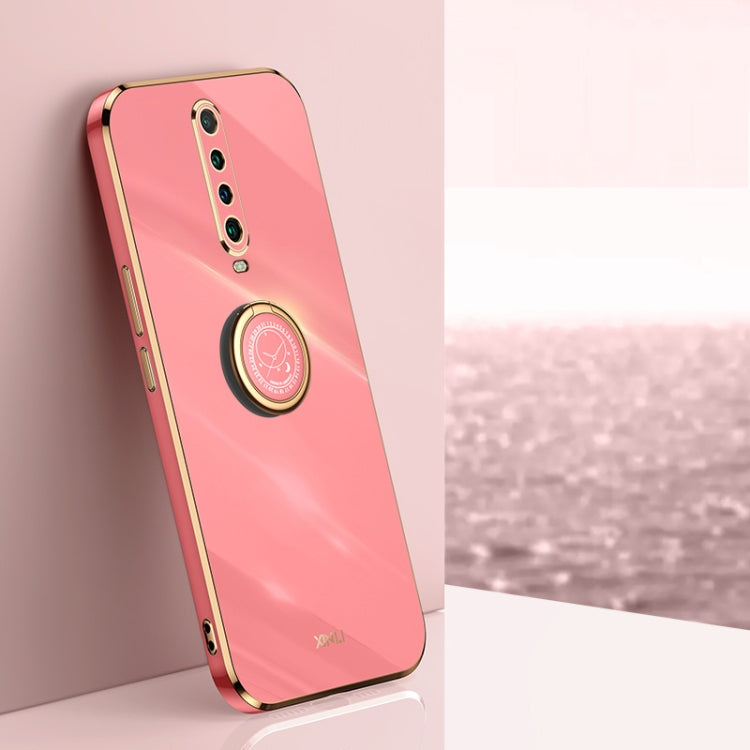 Coral pink TPU phone case with gold ring holder and vertical camera cutouts