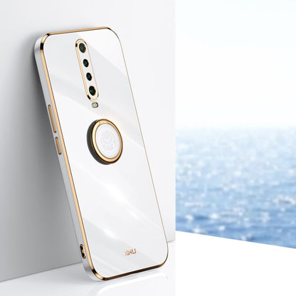 White TPU phone case with gold ring holder and vertical camera cutouts